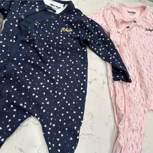 Designer European baby matching blue and pink outfits!